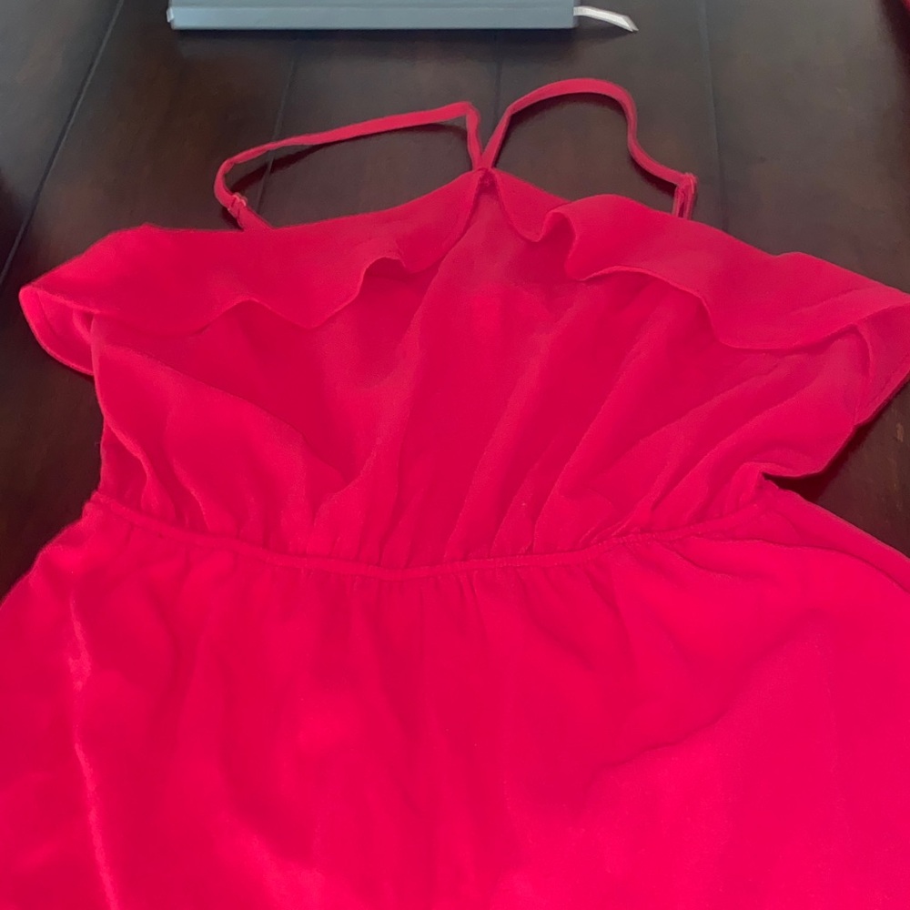 Pink halter romper with ruffles